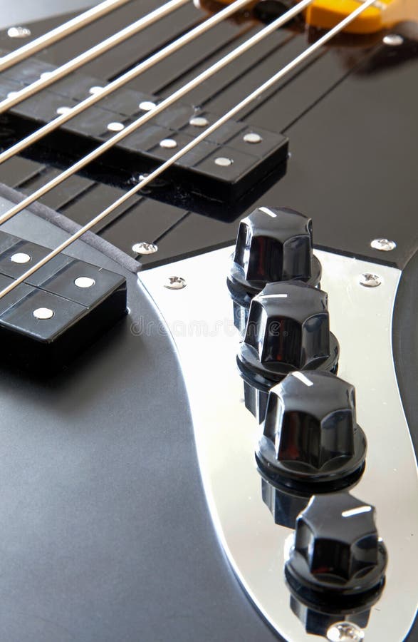 Detail der Bass-Gitarre lizenzfreies stockbild Detail der Bass-Gitarre lizenzfreies stockbild