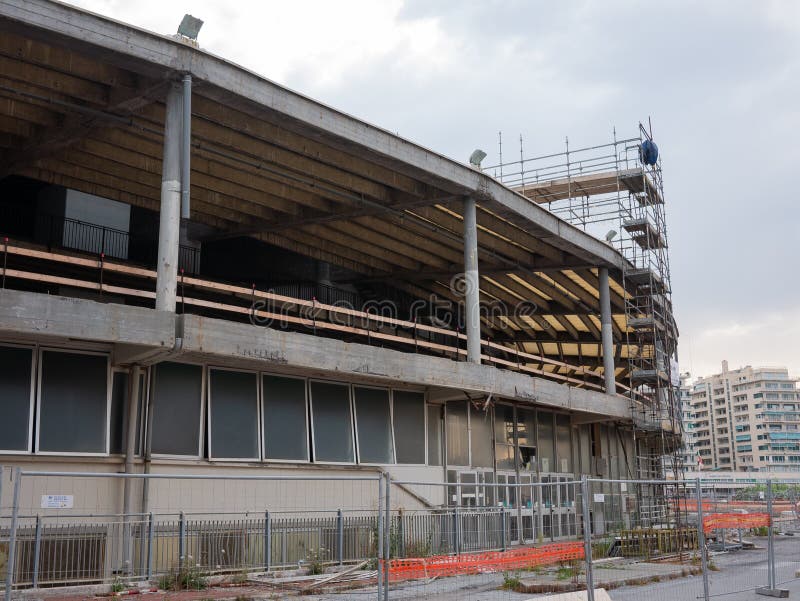 Genoa Italy_July 12, 2021: `Palasport` symbol building of Genoa fair during restyling work. Genoa Italy_July 12, 2021: `Palasport` symbol building of Genoa fair during restyling work