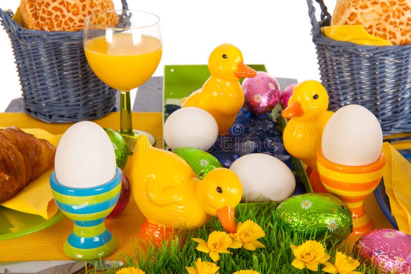 Detail easter table with eggs and bread rolls