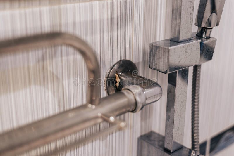 Detail of faucet with limescale or lime scale on it, dirty calcified and rusty shower mixer tap, close up stock images