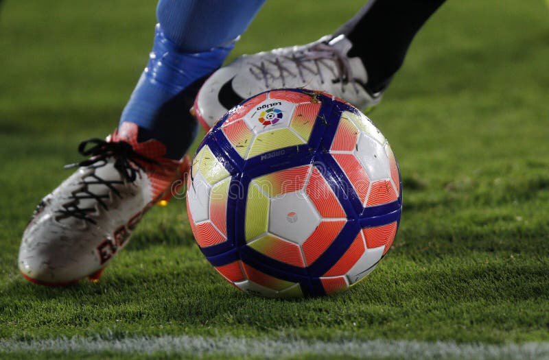 Detail of the feet of a soccer player running with the ball royalty free stock image Detail of the feet of a soccer player running with the ball royalty free stock image