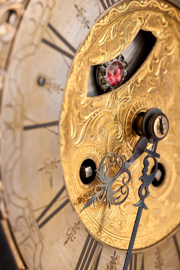Detail of gold historic clock stock photos