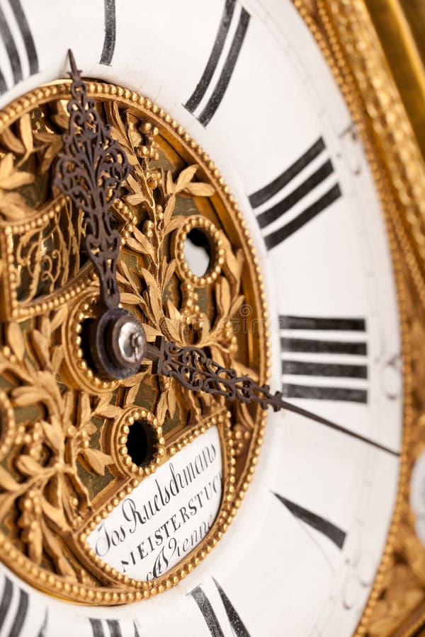 Detail of gold and white historic clock stock image