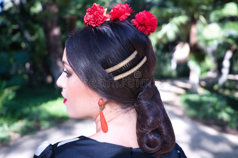 Detail of Hairstyle Earrings of Young Woman Flamenco Artist Brunette  with Typical Black Flamenco Dance Suit and Red Carnations Stock Photo   Image of dots ethnicity 233520904