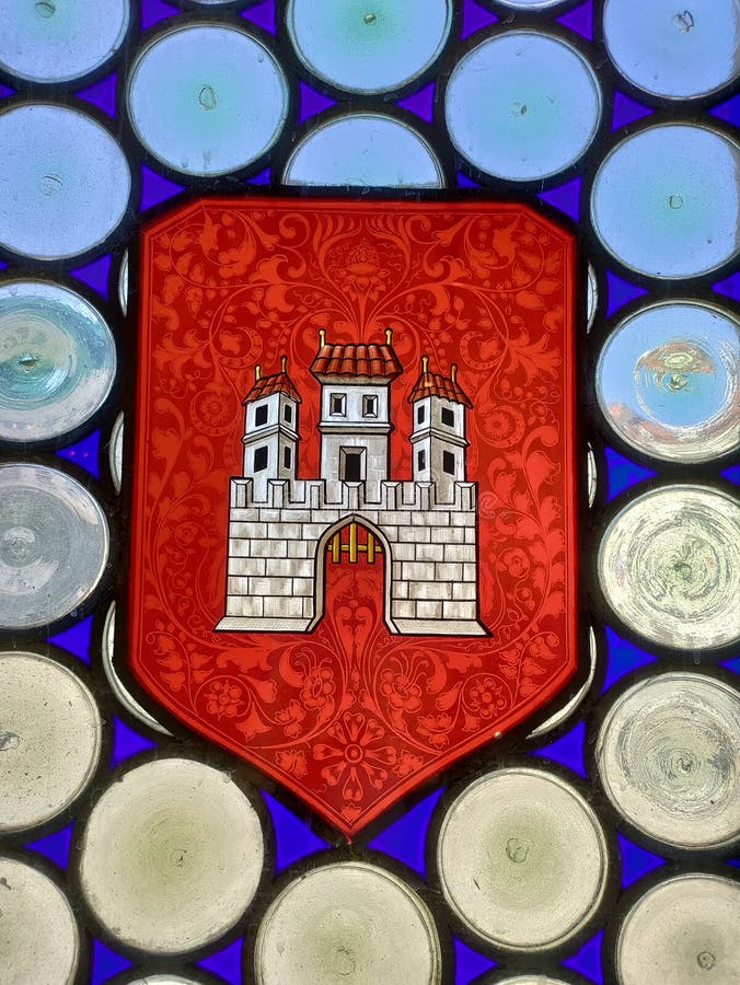 Detail of historic window glass with coat of arms of Bratislava city