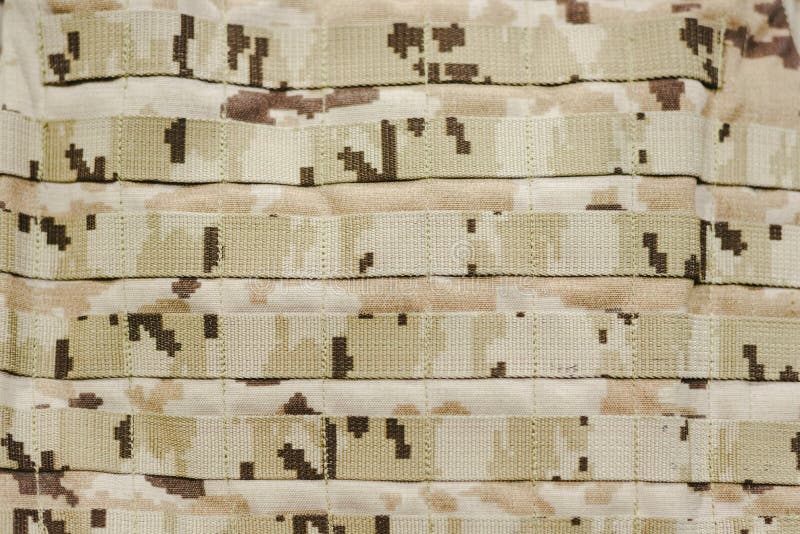 Detail of a military camouflage bulletproof vest royalty free stock images