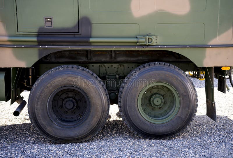Detail of a military vehicle in camouflage stock images