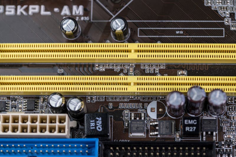Detail of a Motherboard with Connectors and Heatsinks Editorial Photo