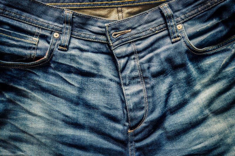 Detail of nice blue jeans in old vintage style royalty free stock photography