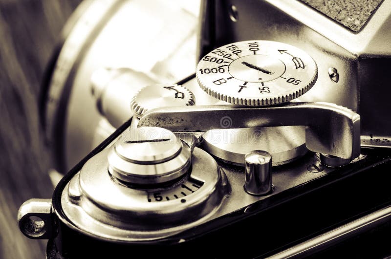 Detail of old classic camera in vintage style stock photography