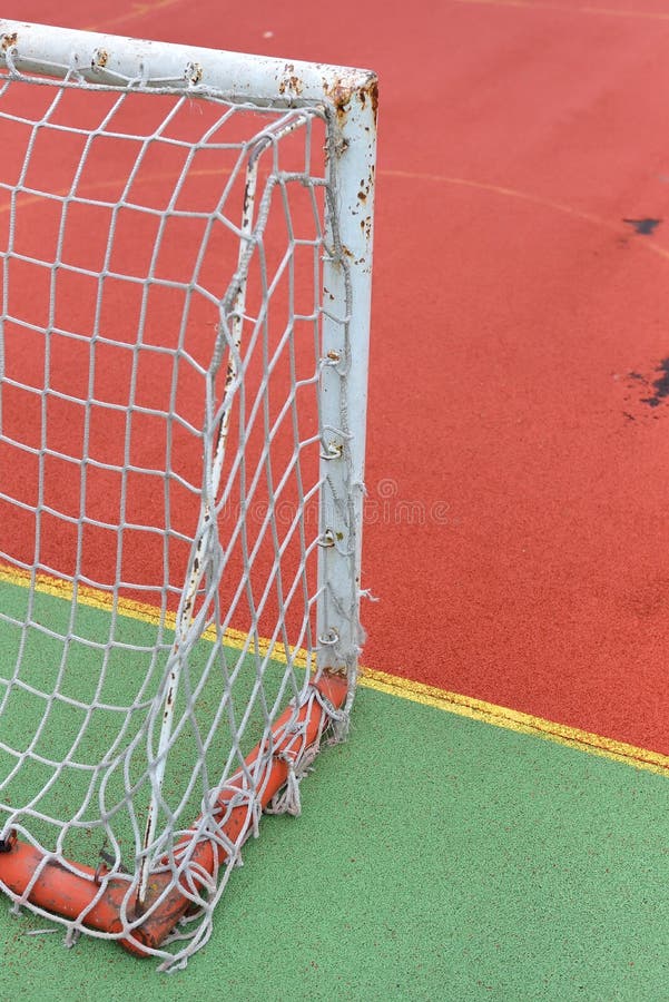 Detail of old and rusty gate of mini football at a soccer field stock photos Detail of old and rusty gate of mini football at a soccer field stock photos