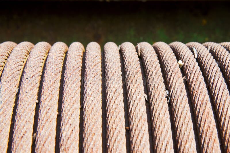 Detail of an old steel cable wrapped up in a coil royalty free stock image Detail of an old steel cable wrapped up in a coil royalty free stock image