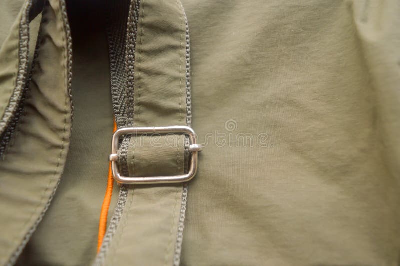 Detail part of Luxury clasp Buckle on strap of a ladies new ladies denim jeans clothing accessories. Women fashion background royalty free stock photo Detail part of Luxury clasp Buckle on strap of a ladies new ladies denim jeans clothing accessories. Women fashion background royalty free stock photo