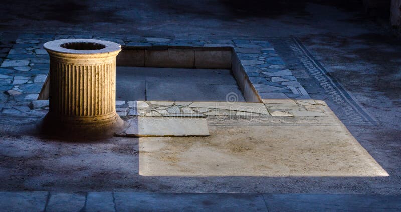 detail of rest of a column situated inside of a building in a ruin of former italian city pompeii....IMAGE royalty free stock photo