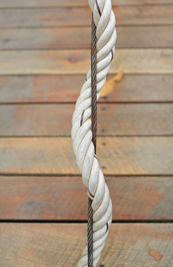 Detail of sling and rope for safety on the wood bridge stock image Detail of sling and rope for safety on the wood bridge stock image