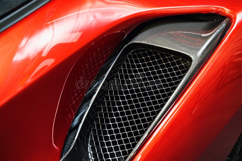 Car Under Hood Close Up, View Of A Red Engine With Big Black Round Air  Intake Filter, Tubes, Wires, Pipes, Mechanical And Electrical Other Parts  Stock Photo, Picture and Royalty Free Image.