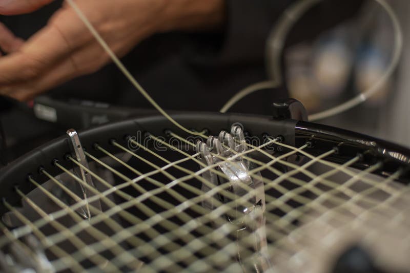 Detail of tennis racket in the stringing machine