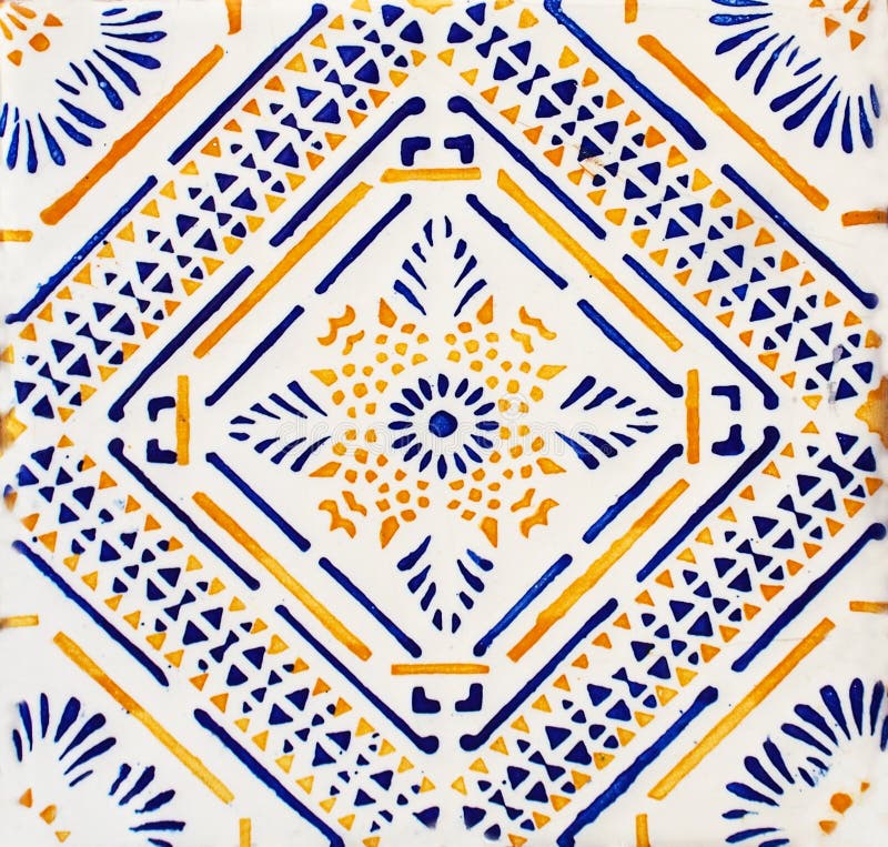 Detail of the traditional tiles from facade of old house. Decorative tiles.Valencian traditional tiles. Floral ornament. Majolica