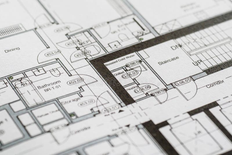 Detail view of architectural and structural construction drawings with designer tools. stock images