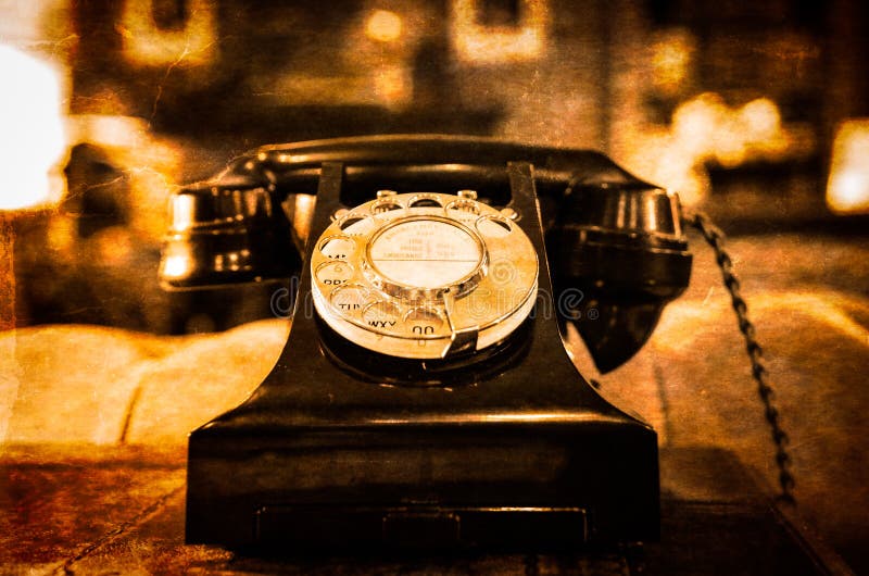 Detail view of old vintage dial telephone on the table royalty free stock photo