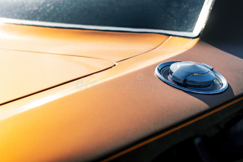 Detail of a vintage car headlight on a classic car. close up nice line and dusty layer