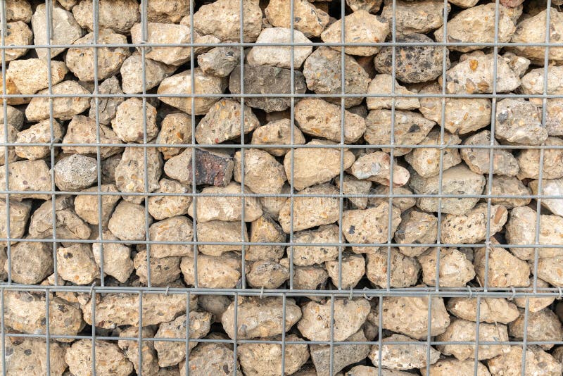Detail of Wall building blocks with mesh wire stone basket
