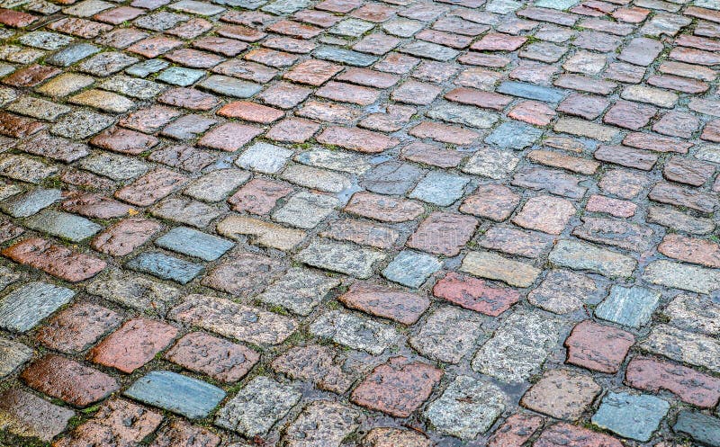 Detailed close up view on cobblestone street textures in high resolution royalty free stock image