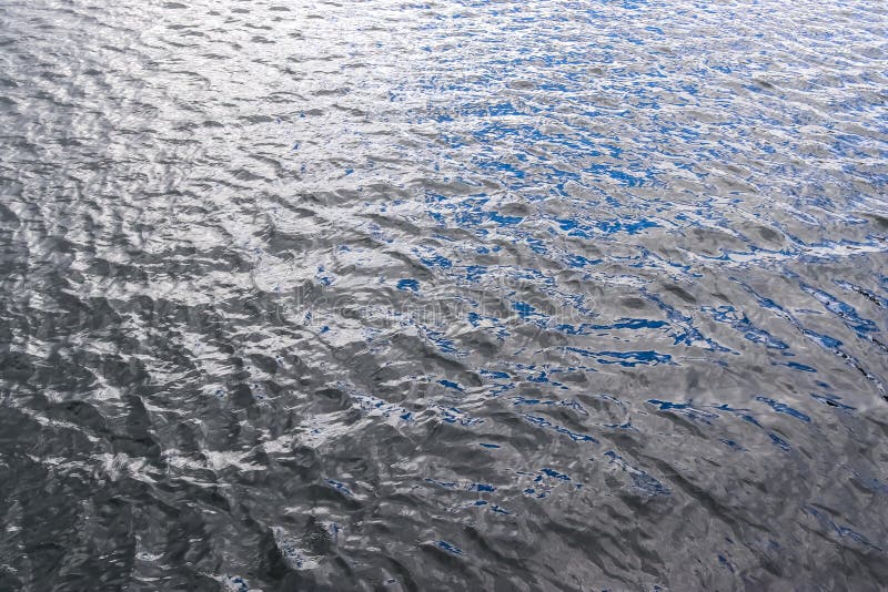 Detailed Close Up View on Water Surfaces with Ripples and Waves and the ...