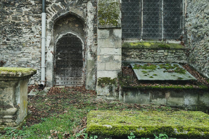 Detailed view of the entrance to a medieval church showing the crypt door.