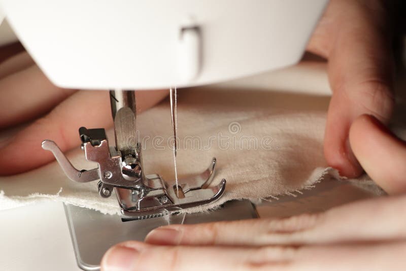 A Detailed View of the Sewing Process. Needle with Thread Stock Image