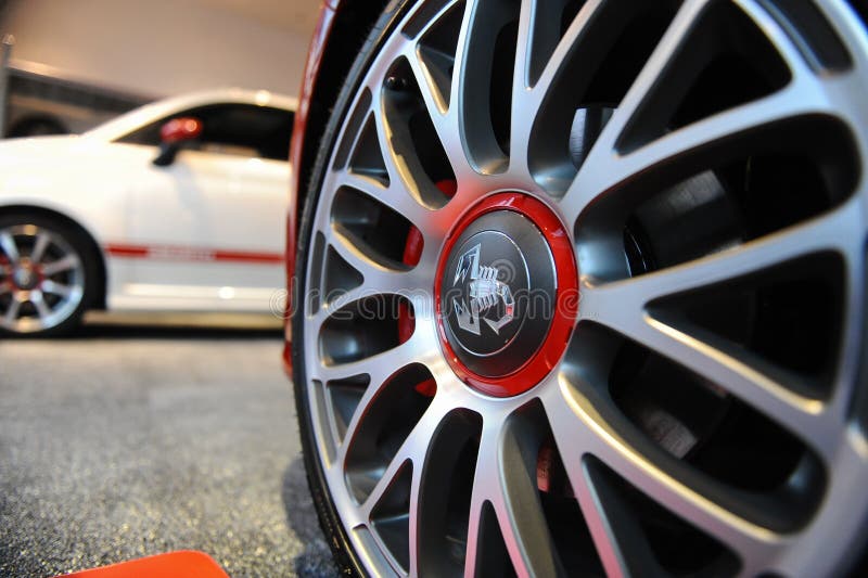 Details with the Abarth Logo on a Car Wheel Inside a Editorial