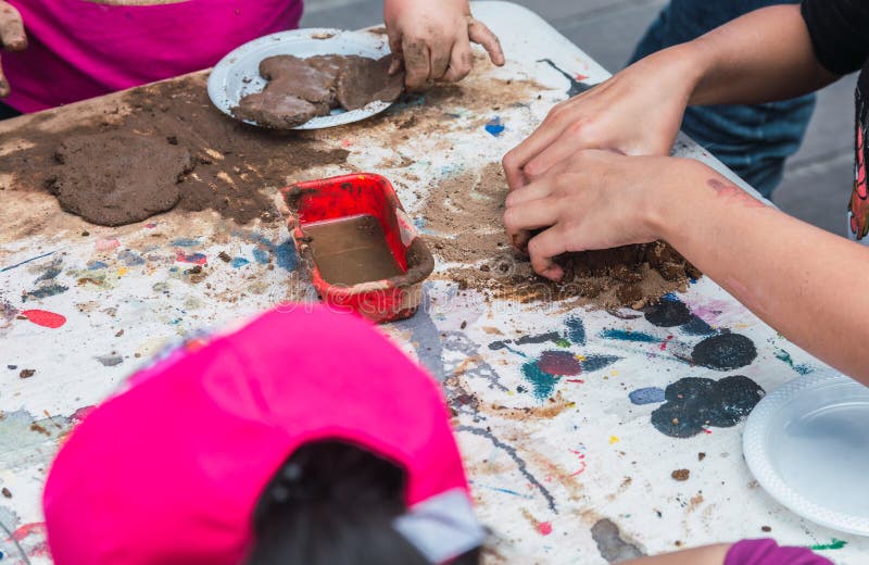 Details of Children`s Hands Molding Clay in an Artistic Learning