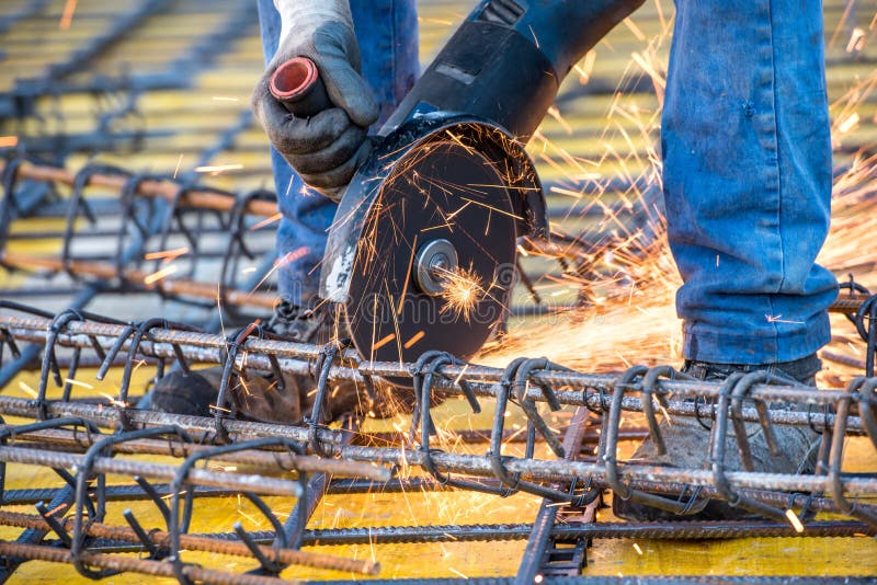 Details of construction engineer worker cutting steel bars and reinforced steel at building site