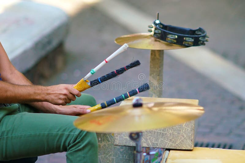 Details of the hands of a drummer making music in Ermou street stock images Details of the hands of a drummer making music in Ermou street stock images