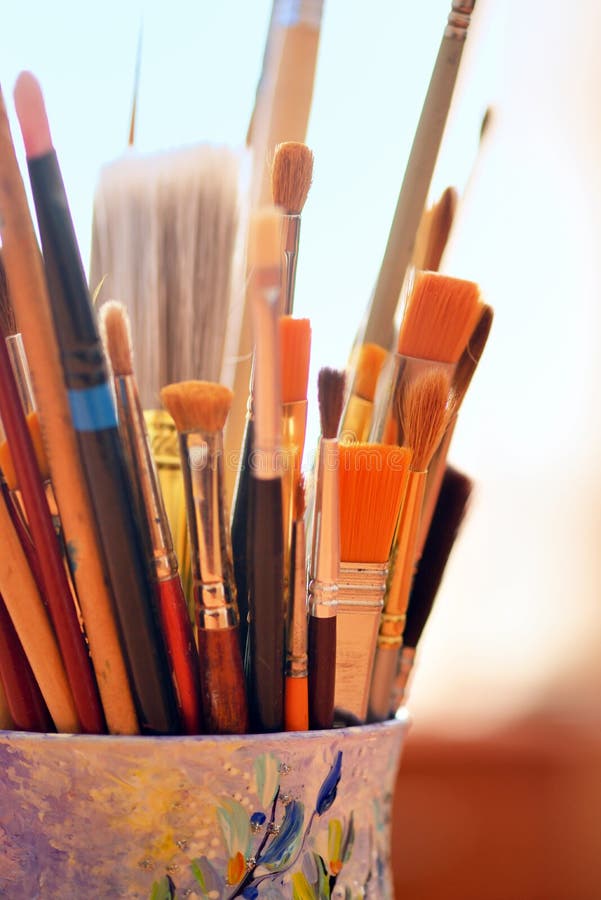 Paint brushes in a glass stock image. Image of brushes 143350863