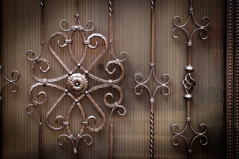 Details, structuur en ornamenten van gesmede ijzerpoort Bloemendec stock fotografie Details, structuur en ornamenten van gesmede ijzerpoort Bloemendec stock fotografie