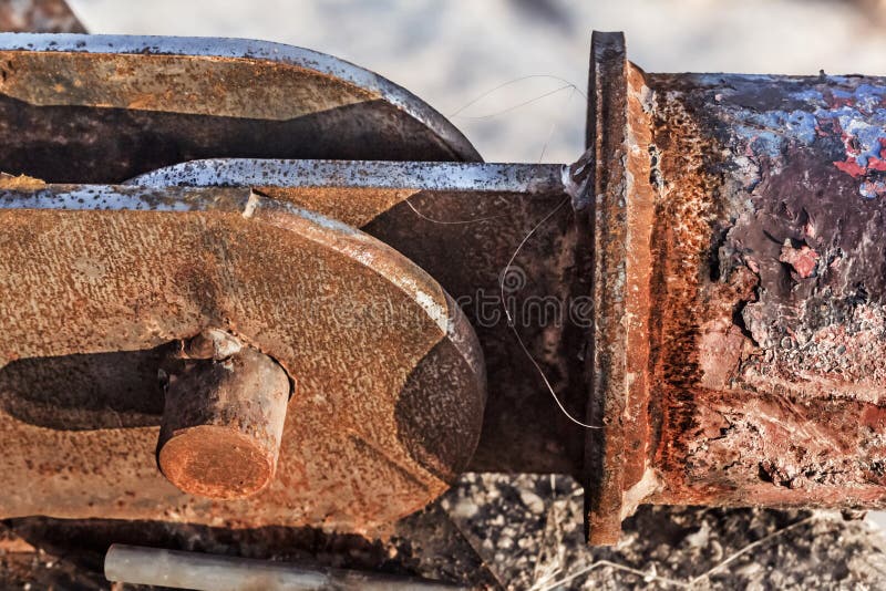 Old Corroded River Raft Hut Docking Bumper Swivel Joint Detail. Old Corroded River Raft Hut Docking Bumper Swivel Joint Detail.