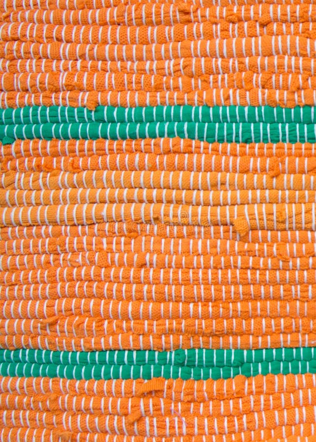Detalhe de laranja com o tapete de pano verde fotografia de stock royalty free Detalhe de laranja com o tapete de pano verde fotografia de stock royalty free