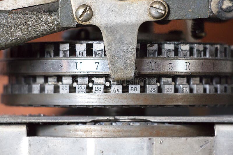 Closeup detail of the letters and numbers of a vintage dog tag labeling system. Closeup detail of the letters and numbers of a vintage dog tag labeling system.