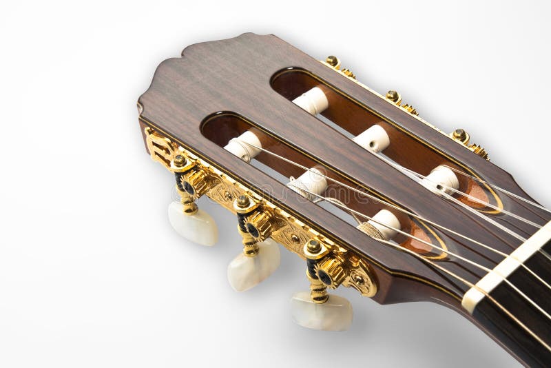 Detalhe de uma pá dourada de uma guitarra clássica profissional fotografia de stock Detalhe de uma pá dourada de uma guitarra clássica profissional fotografia de stock