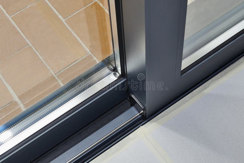 Detalj och stång för dörr för glidningsexponeringsglas arkivbilder Detalj och stång för dörr för glidningsexponeringsglas arkivbilder