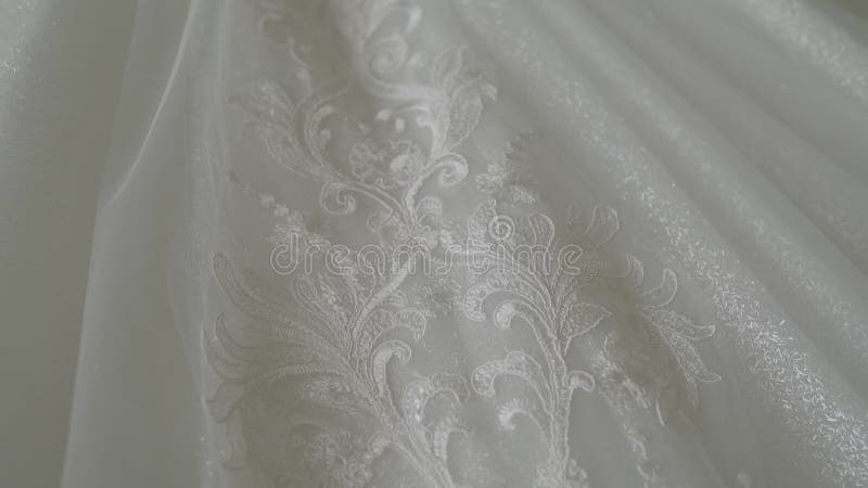 Detalles del cierre del vestido de boda