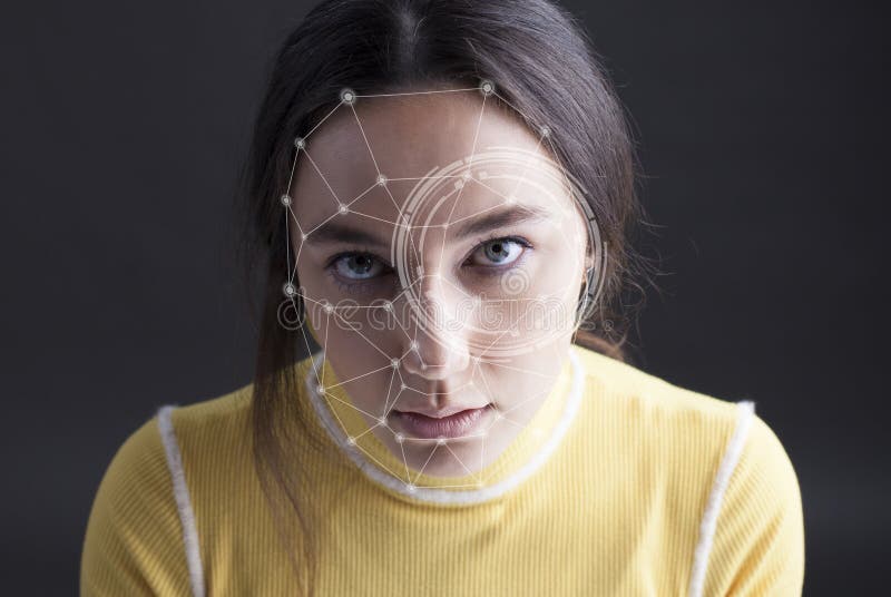 Detecci?n biom?trica de la cara de la mujer de la verificaci?n imagen de archivo libre de regalías Detecci?n biom?trica de la cara de la mujer de la verificaci?n imagen de archivo libre de regalías