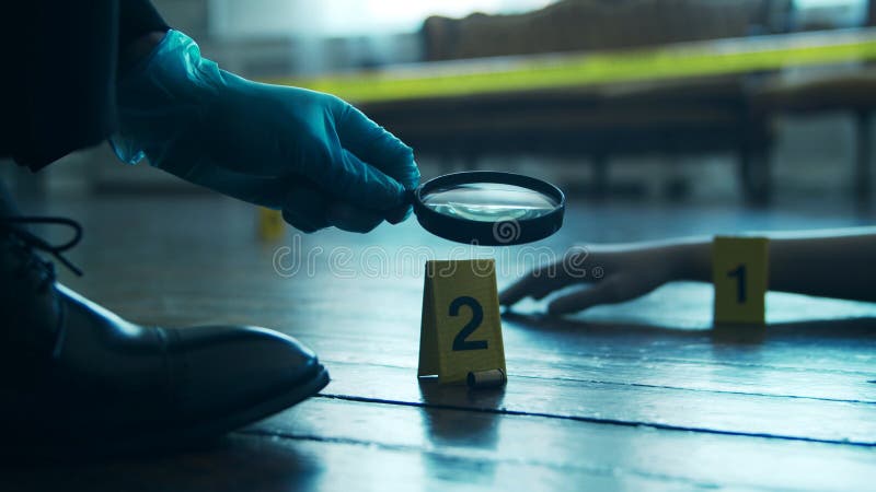 Detective Collecting Evidence in a Crime Scene. Forensic Specialists
