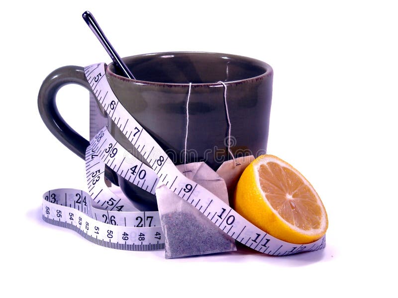 Measuring tape wrapped around a warm mug of lemon tea isolated on white background. Measuring tape wrapped around a warm mug of lemon tea isolated on white background