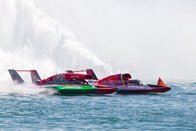 DETROIT - JULY 14 : Steve David and Jimmy Shane race neck and neck at the APBA Gold Cup July 14, 2013 on the Detroit River in Detroit, Michigan. DETROIT - JULY 14 : Steve David and Jimmy Shane race neck and neck at the APBA Gold Cup July 14, 2013 on the Detroit River in Detroit, Michigan.