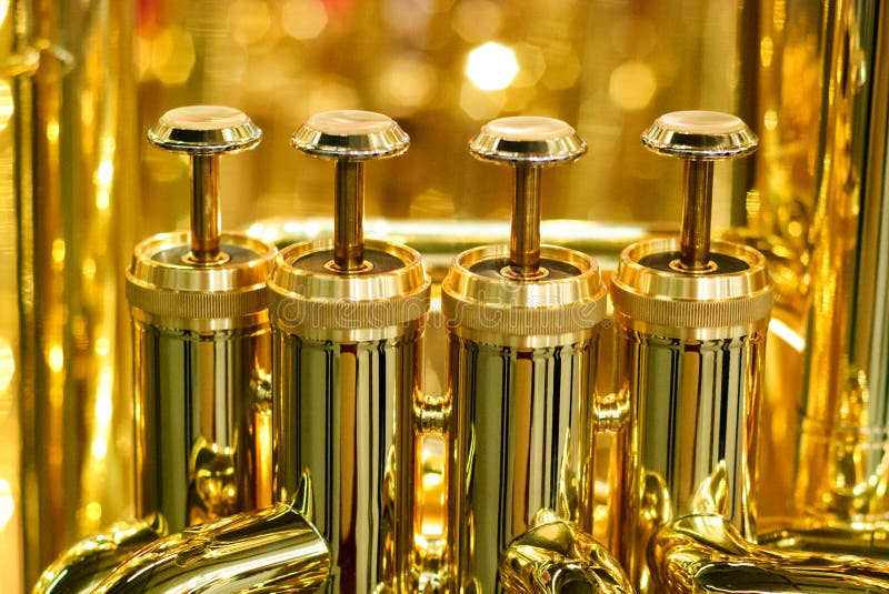 Golden tuba brass valve detail. Golden tuba brass valve detail