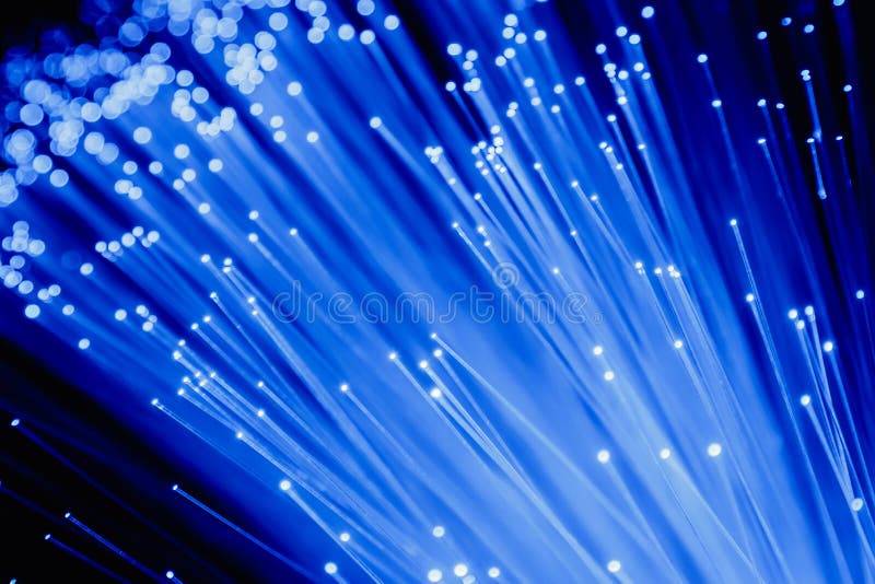 Dettaglio del mazzo crescente blu di fondo delle fibre ottiche, veloce fotografie stock libere da diritti Dettaglio del mazzo crescente blu di fondo delle fibre ottiche, veloce fotografie stock libere da diritti