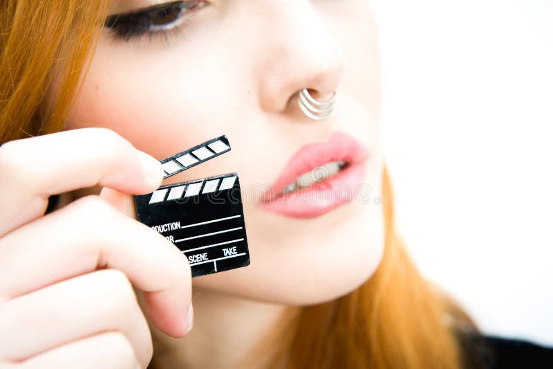 Dettaglio di poco fronte della donna del bordo e della testarossa di valvola di film immagine stock libera da diritti Dettaglio di poco fronte della donna del bordo e della testarossa di valvola di film immagine stock libera da diritti