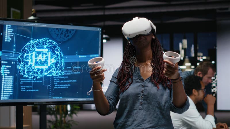 Developer in office using VR headset gear to analyze machine learning algorithms stock video